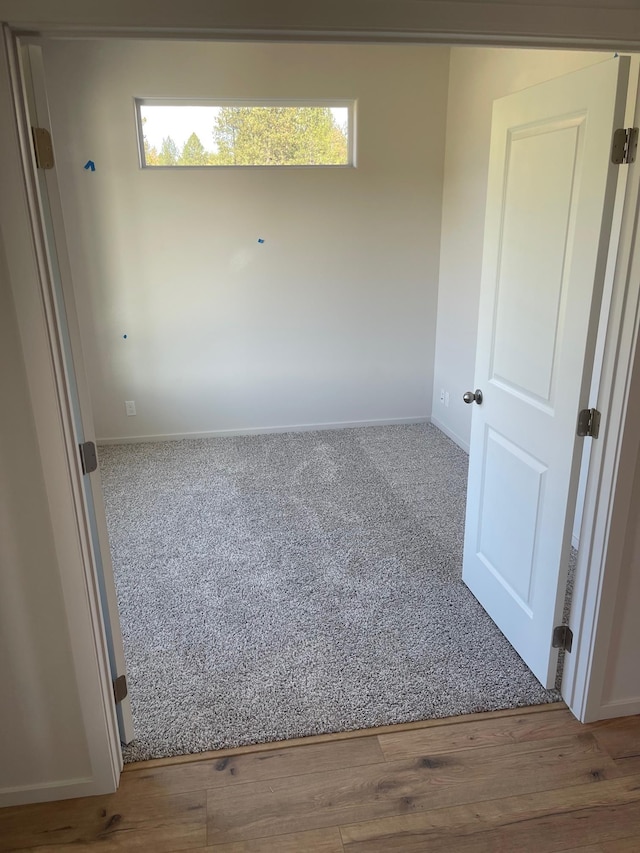 18718 E Riverside Ct, Spokane Valley, WA 99016 - spare room featuring baseboards and carpet
