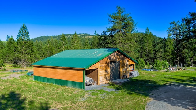 20 River Ranch Rd, Kettle Falls, WA 99141 - view of pole building featuring a forest view and a yard
