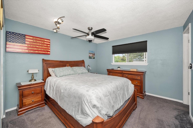 24005 E Garland Ave, Otis Orchards, WA 99027 - bedroom with dark carpet, a textured ceiling, baseboards, and ceiling fan