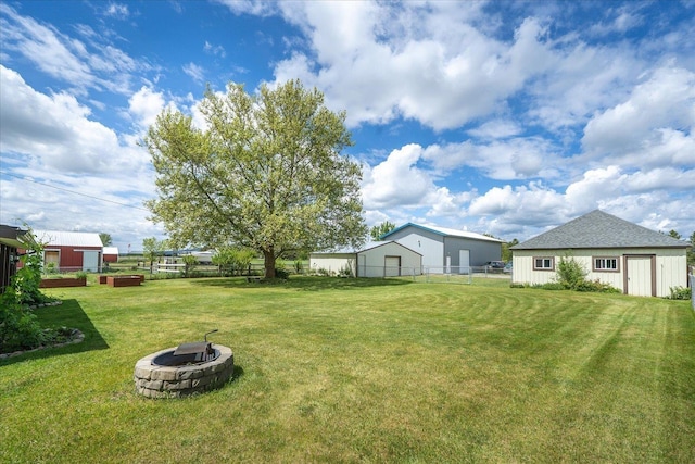 24005 E Garland Ave, Otis Orchards, WA 99027 - view of yard with a fire pit and an outbuilding