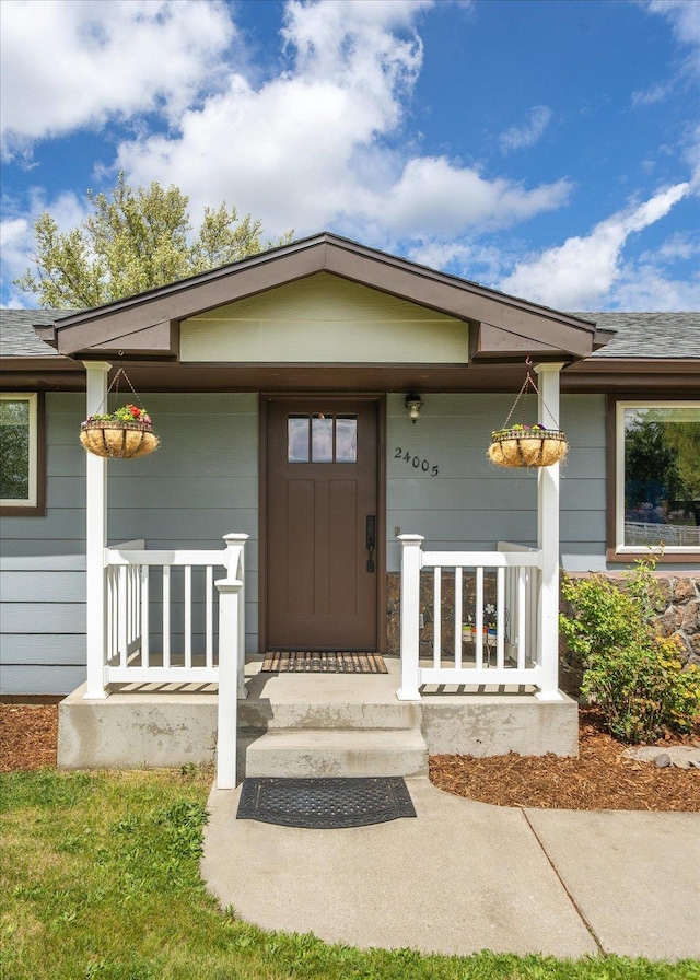 24005 E Garland Ave, Otis Orchards, WA 99027 - property entrance featuring covered porch
