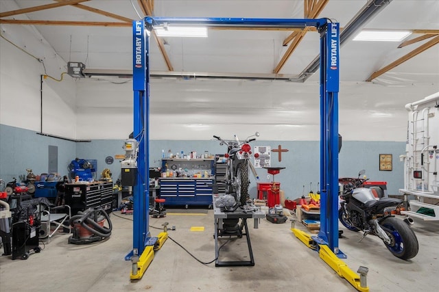 24005 E Garland Ave, Otis Orchards, WA 99027 - garage featuring a workshop area
