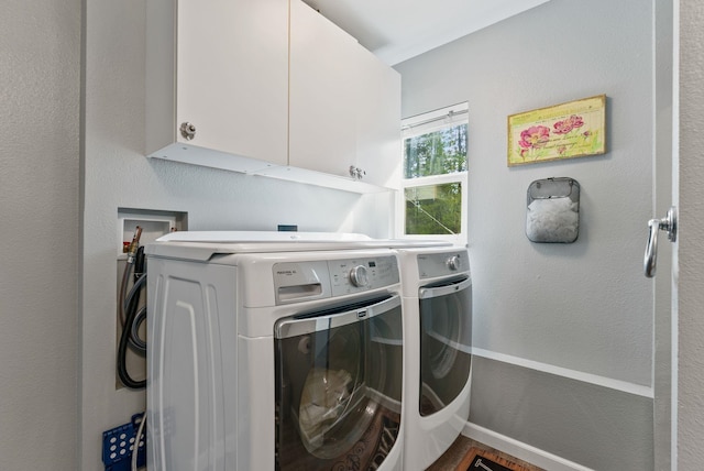 4109 S Hollow Ct, Spokane, WA 99206 - clothes washing area with cabinet space and separate washer and dryer