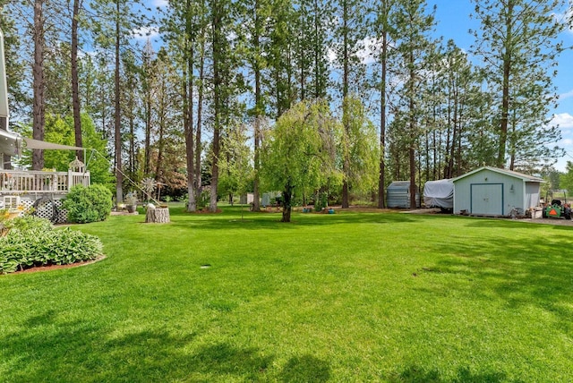 4109 S Hollow Ct, Spokane, WA 99206 - view of green lawn with a shed and an outdoor structure