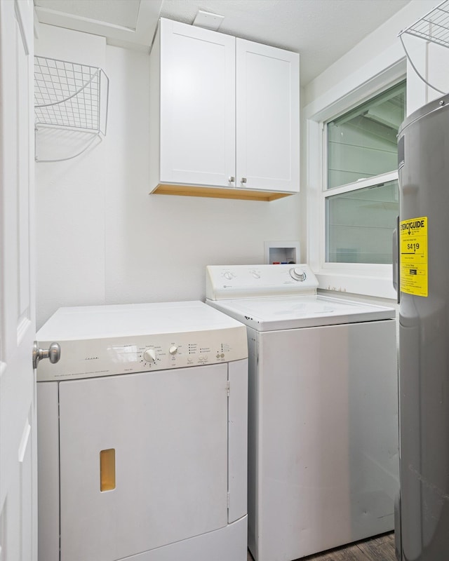 3424 W Princeton Ave, Spokane, WA 99205 - laundry room featuring separate washer and dryer, water heater, and cabinet space