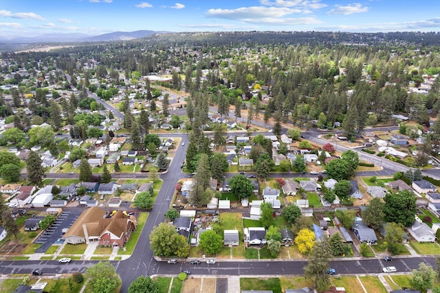 3424 W Princeton Ave, Spokane, WA 99205 - aerial overview of property's location featuring a mountainous background and nearby suburban area