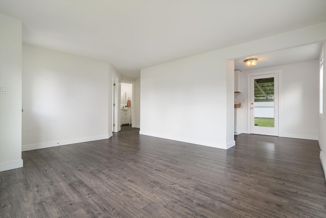 3424 W Princeton Ave, Spokane, WA 99205 - spare room with dark wood-style floors and baseboards