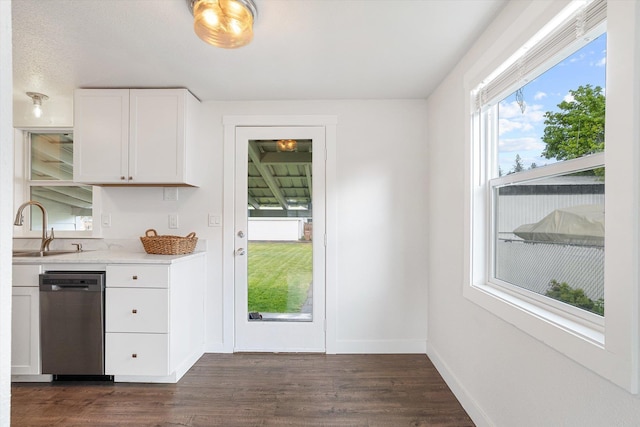 3424 W Princeton Ave, Spokane, WA 99205 - kitchen with dishwasher, a sink, dark wood finished floors, and white cabinetry