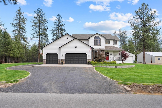 6482 Lakeview Dr, Nine Mile Falls, WA 99026 - view of front facade with a front yard, asphalt driveway, an attached garage, covered porch, and a shingled roof