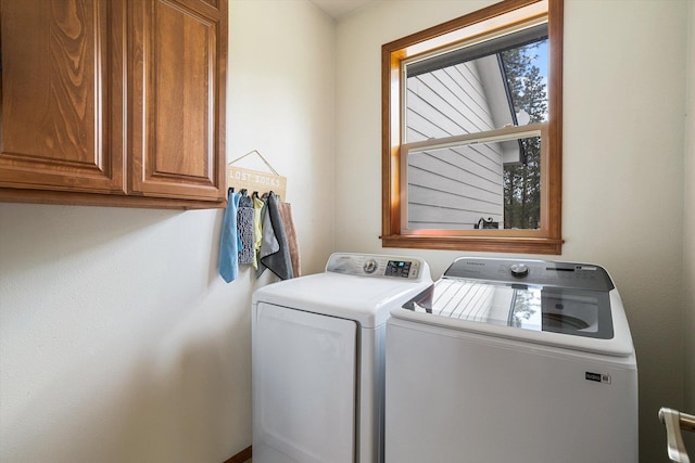 6482 Lakeview Dr, Nine Mile Falls, WA 99026 - laundry area with washer and dryer and cabinet space