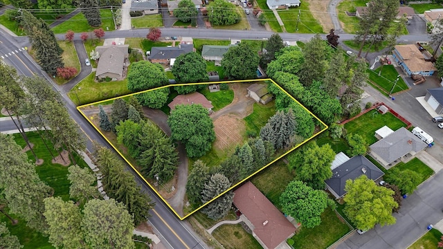 aerial view of residential area with property boundaries highlighted