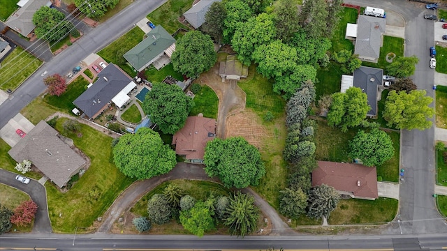 aerial view of property's location with nearby suburban area