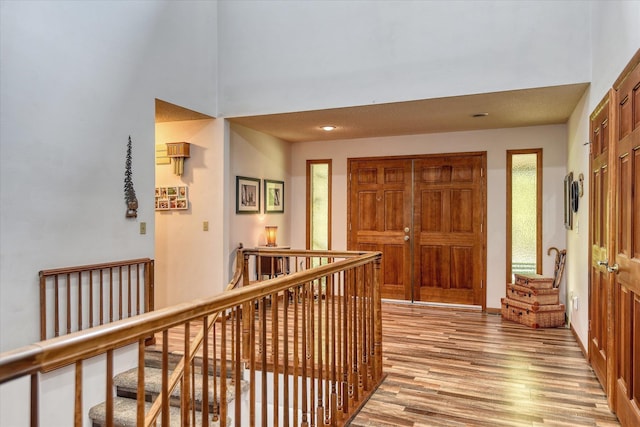 8410 E Columbia Park Dr, Spokane, WA 99212 - entryway with light wood-type flooring, a high ceiling, and recessed lighting