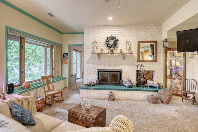 8410 E Columbia Park Dr, Spokane, WA 99212 - carpeted living room with a fireplace and recessed lighting
