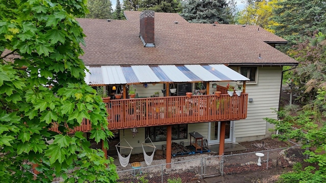 8410 E Columbia Park Dr, Spokane, WA 99212 - rear view of property featuring roof with shingles, a patio area, a fenced backyard, and a wooden deck