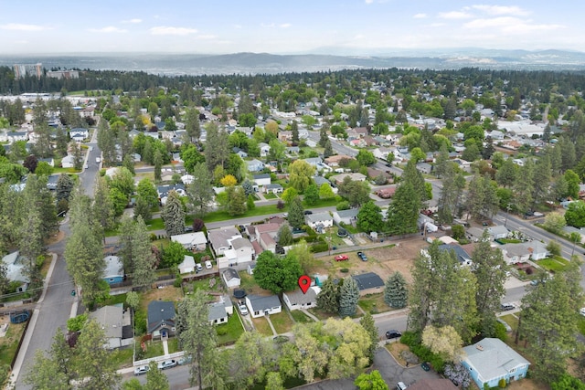3123 E 36th Ave, Spokane, WA 99223 - aerial view of property's location with mountains and nearby suburban area