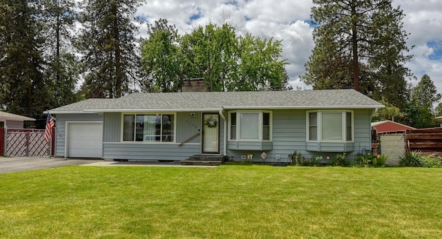 9509 N Atlantic St, Spokane, WA 99218 - single story home with driveway, an attached garage, a chimney, entry steps, and roof with shingles