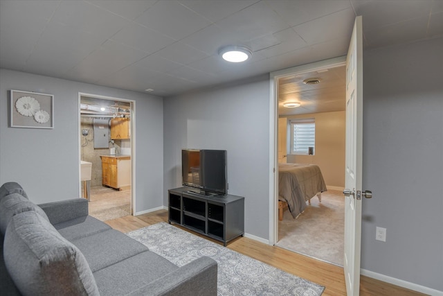9509 N Atlantic St, Spokane, WA 99218 - living area with light wood-style flooring and baseboards
