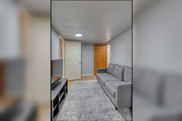 9509 N Atlantic St, Spokane, WA 99218 - living room featuring wood finished floors and a paneled ceiling