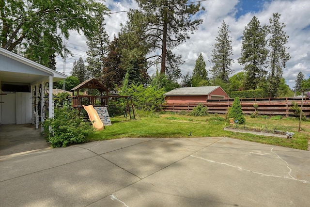 9509 N Atlantic St, Spokane, WA 99218 - view of patio / terrace with a playground