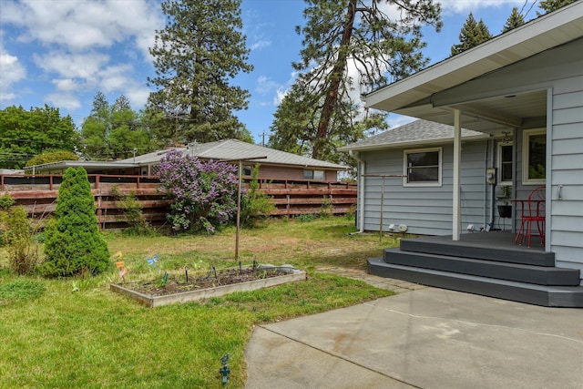 9509 N Atlantic St, Spokane, WA 99218 - view of yard with a vegetable garden