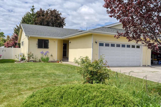 6923 N Hamilton St Unit 6923, Spokane, WA 99208 - ranch-style home featuring driveway, an attached garage, and a shingled roof