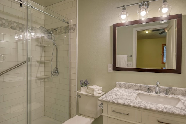 6923 N Hamilton St Unit 6923, Spokane, WA 99208 - bathroom with a stall shower, vanity, toilet, and a textured wall