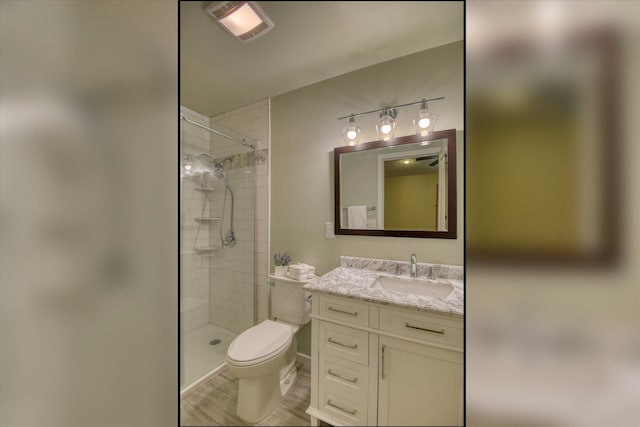 6923 N Hamilton St Unit 6923, Spokane, WA 99208 - bathroom with a stall shower, toilet, and vanity