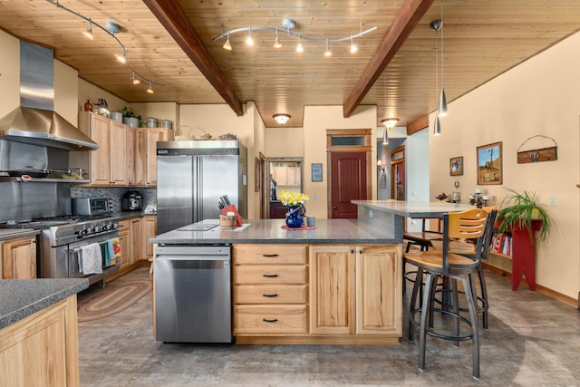 kitchen featuring light brown cabinets, track lighting, wall chimney range hood, premium appliances, and wood ceiling
