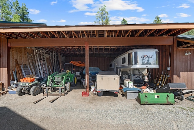 view of parking featuring a detached carport