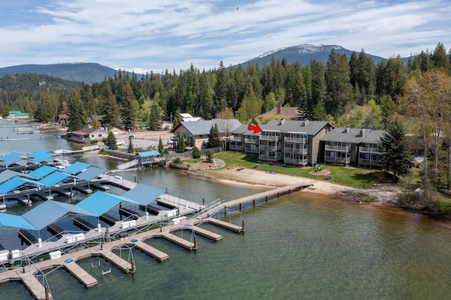 328 Bayview Dr Unit 12, Coolin, ID 83821 - drone / aerial view of a heavily wooded area and a water and mountain view