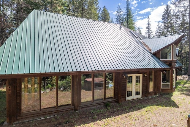 652 Penny Ln, Usk, WA 99180 - view of property exterior featuring metal roof and french doors