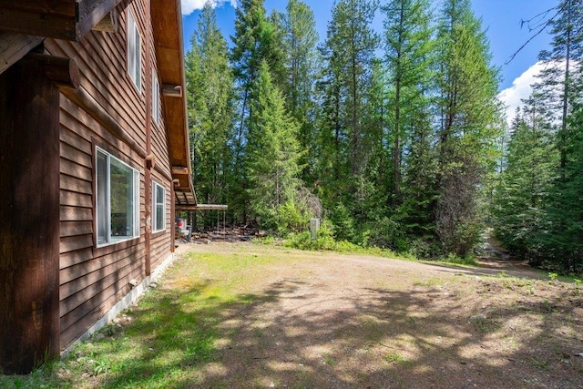 652 Penny Ln, Usk, WA 99180 - view of yard featuring a wooded view