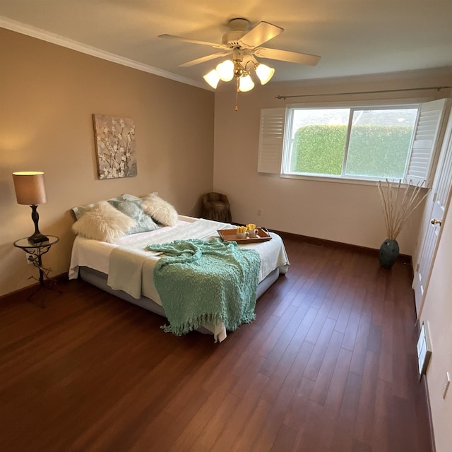 1610 S Newer Ln Unit 0, Spokane Valley, WA 99037 - bedroom with baseboards, crown molding, dark wood finished floors, and a ceiling fan