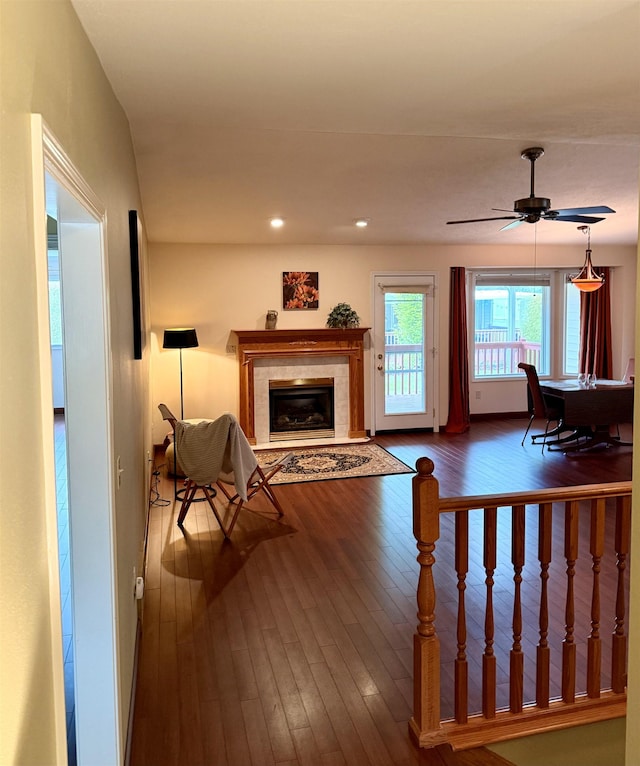 1610 S Newer Ln Unit 0, Spokane Valley, WA 99037 - living room with a tiled fireplace, dark wood-style floors, recessed lighting, and ceiling fan