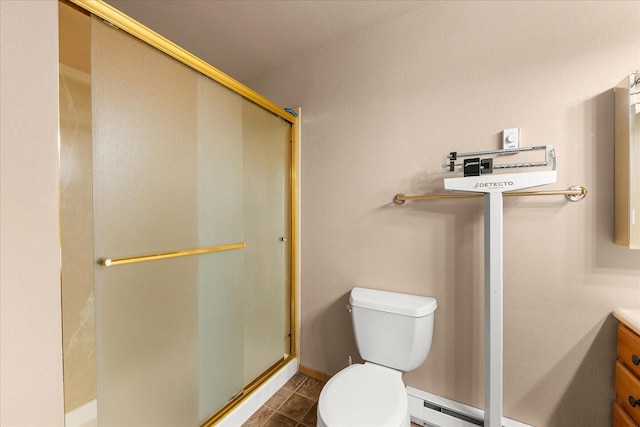 172 S Coeur Dalene St Unit G304, Spokane, WA 99204 - bathroom featuring a shower stall, toilet, vanity, and tile patterned flooring