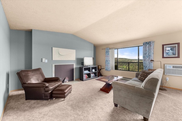 172 S Coeur Dalene St Unit G304, Spokane, WA 99204 - living area with carpet floors, lofted ceiling, a textured ceiling, an AC wall unit, and baseboards