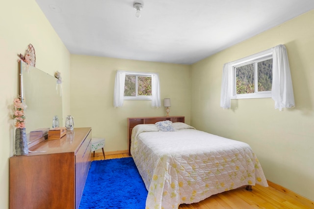 4345 Wilcox Rd, Northport, WA 99157 - bedroom with light wood-type flooring and baseboards
