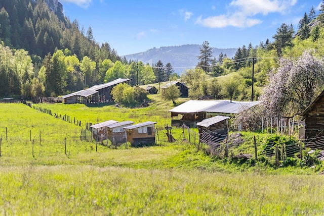 4345 Wilcox Rd, Northport, WA 99157 - view of mountain background featuring a heavily wooded area