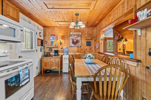 231 Mountain View Dr, Newport, WA 99156 - dining area with wood ceiling, wooden walls, dark wood-style flooring, and a chandelier
