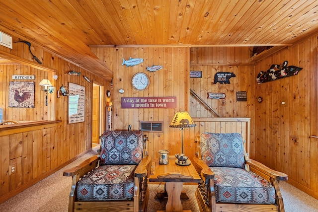 231 Mountain View Dr, Newport, WA 99156 - sitting room with wood walls, carpet flooring, wooden ceiling, and baseboards