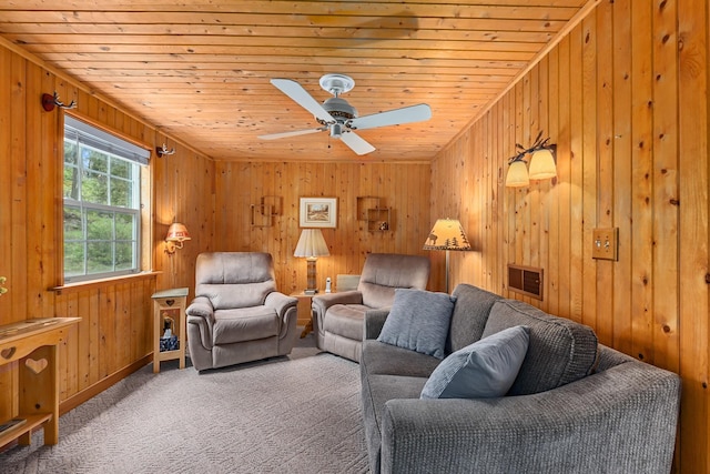 231 Mountain View Dr, Newport, WA 99156 - living area featuring wooden ceiling, wooden walls, carpet floors, and a ceiling fan