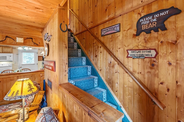 231 Mountain View Dr, Newport, WA 99156 - staircase featuring wooden walls and wooden ceiling