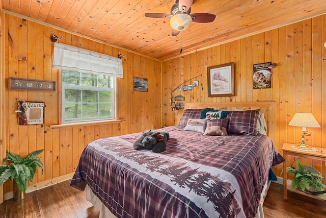 231 Mountain View Dr, Newport, WA 99156 - bedroom featuring wood ceiling, wood-type flooring, wood walls, and baseboards