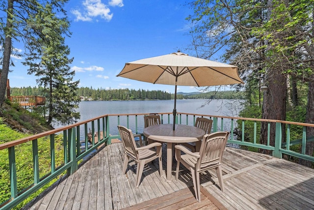 231 Mountain View Dr, Newport, WA 99156 - wooden terrace with a water view and outdoor dining area
