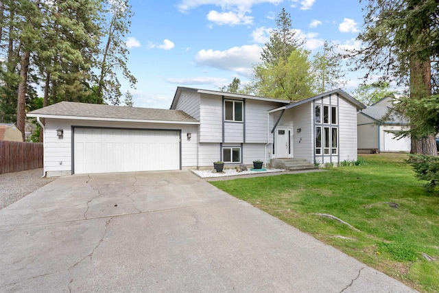 view of front of house featuring an attached garage and driveway