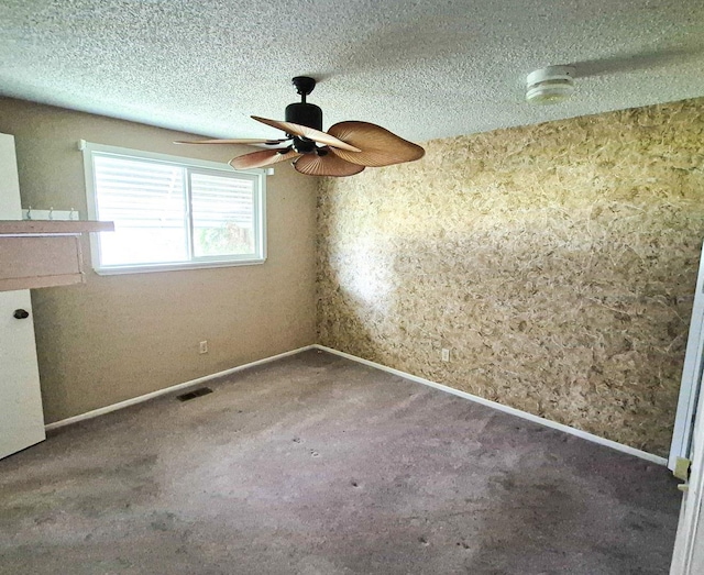 306 S Bernard St, Chewelah, WA 99109 - spare room with carpet floors, a textured ceiling, a ceiling fan, baseboards, and a smoke detector