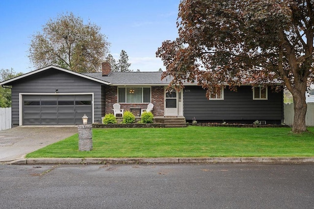 8214 N Jefferson Dr, Spokane, WA 99208 - ranch-style house with an attached garage, a chimney, concrete driveway, a front yard, and brick siding
