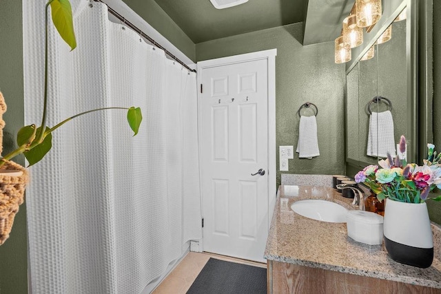 8214 N Jefferson Dr, Spokane, WA 99208 - full bath featuring vanity, tile patterned floors, and a shower with curtain