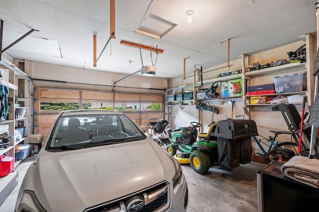 8214 N Jefferson Dr, Spokane, WA 99208 - garage featuring a garage door opener